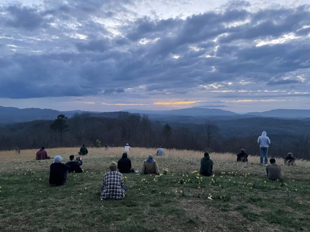 Brothers of Phi Kappa Chi settle down at the top of a hike to devote time to prayer and God. Photo courtesy of Chris Navarro.