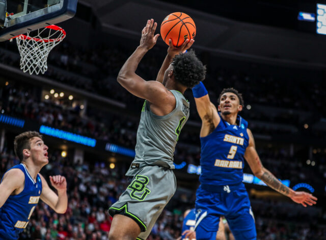 Junior guard LJ Cryer shoots a right-handed runner from the left side of the basket during No. 3 seed Baylor men's basketball's round of 64 contest against No. 14 seed University of Califorinia, Santa Barbara, Friday, in the Ball Arena, in Denver.
Kenneth Prabhakar | Photo Editor