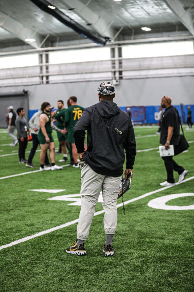 One of the NFL scouts stands and watches the events unfold during Baylor football's Pro Day, on Monday, in Midway's Activity Center, in Hewitt.
Kenneth Prabhakar | Photo Editor