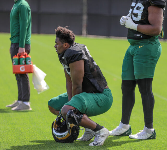 Senior defensive lineman Gabe Hall (95) squats down in between drills during Baylor football's third day of spring camp, on Tuesday, at the team's outdoor practice field.
Kenneth Prabhakar | Photo Editor