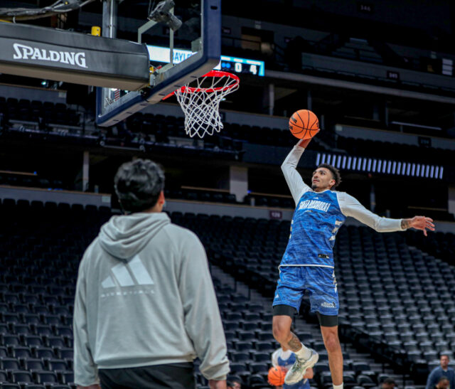 Senior forward Miles Norris (5) rises up for a slam dunk during No. 14 seed University of Santa Barbara, California's team practice before its round of 64 contest against No.3 seed Baylor men's basketball, on Thursday, in the Ball Arena, in Denver.
Kenneth Prabhakar | Photo Editor