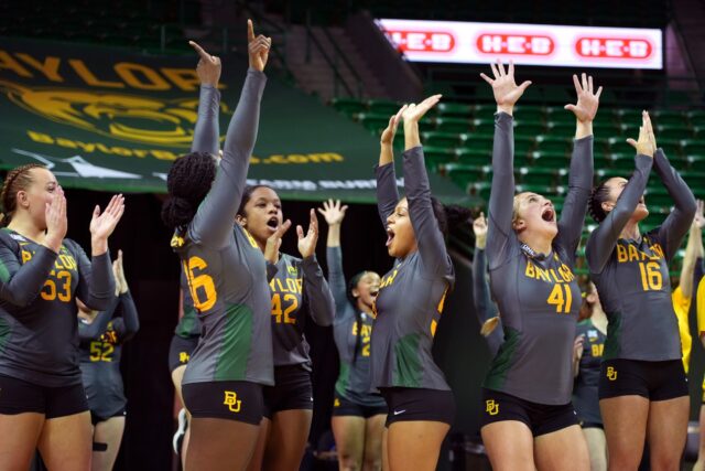 The No. 1 Baylor acrobatics and tumbling team celebrates during the Bears’ meet against No. 12 Frostburg State University, on March 22, in the Ferrell Center
Olivia Havre | Photographer