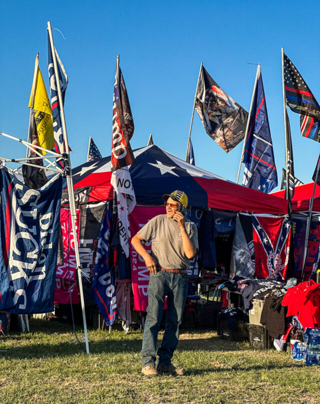 Trump supporters were excited to be back at a campaign rally again and sold a multitude of flags to the attendees. Kenneth Prabhakar | Photo Editor