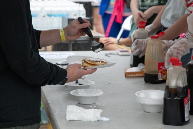 Attendees had a variety of toppings to put on their pancake stacks. Katy Mae Turner | Photographer