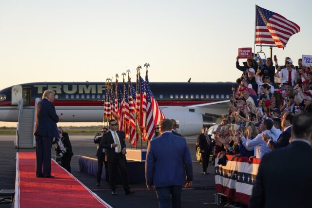 Former President Donald Trump looks to the crowd as he leaves after speaking at a campaign rally at Waco Regional Airport Saturday in Waco. (AP Photo/Evan Vucci)