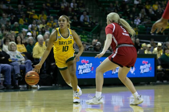 Senior guard Jaden Owens (10) dribbles toward the baseline during a conference game against Texas Tech University, Saturday, in the Ferrell Center.
Katy Mae Turner | Photographer
