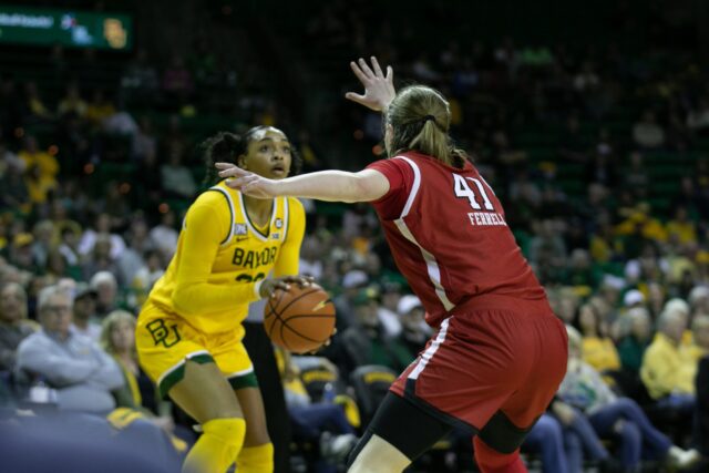 Freshman forward Bella Fontleroy (22) takes the pass and squares up to the basket during a conference game against Texas Tech University, Saturday, in the Ferrell Center.
Katy Mae Turner | Photographer