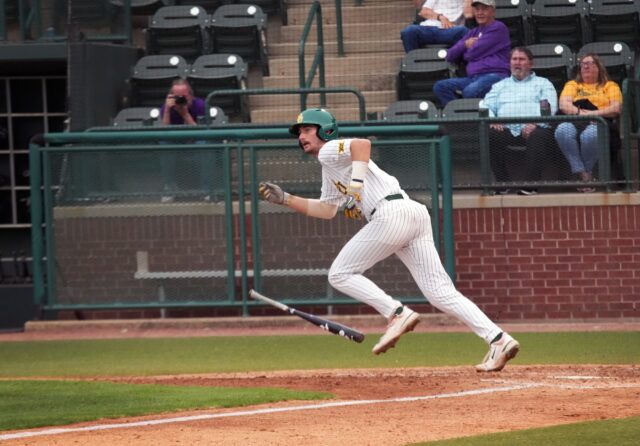 Sophomore infielder Hunter Teplanszky (1) drops his bat and scurries down the first base line during Baylor baseball's midweek contest against Stephen F. Austin State University on April 4 at Baylor Ballpark. Olivia Havre | Photographer
