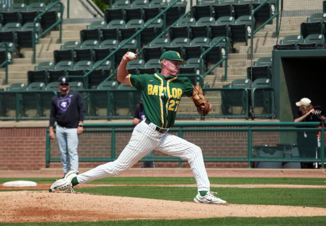 Junior right-handed pitcher Jared Matheson (27) hurls the ball toward the plate during Baylor baseball's midweek contest against Tarleton State University Tuesday afternoon at Baylor Ballpark. Olivia Havre | Photographer