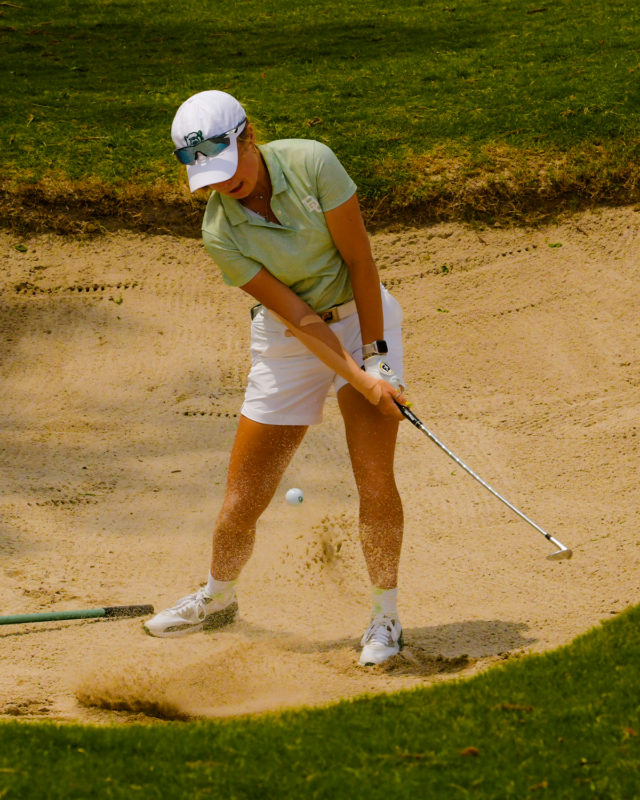 Junior Rosie Belsham chops the ball out of the sand bunker during No. 13 Baylor women's golf's first day the Big 12 Championship on Friday at the Dallas Athletic Club in Dallas.
Photo courtesy of Baylor Athletics