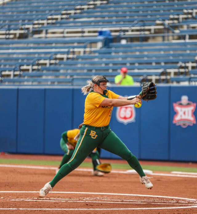 Freshman right-handed pitcher RyLee Crandall (31) winds and throws the pitch toward home plate during No. 4 seed Baylor softball's first round game against No. 5 seed Iowa State University as part of the Phillips 66 Big 12 Softball Championship on Thursday at USA Softball Hall of Fame Stadium in Oklahoma City.
Michael Haag | Sports Editor
