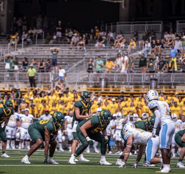 Redshirt sophomore quarterback Sawyer Robertson (13) stands in the shotgun ready for the snap during Baylor football's non-conference game against Long Island on Saturday at McLane Stadium. Lilly Yablon | Photographer