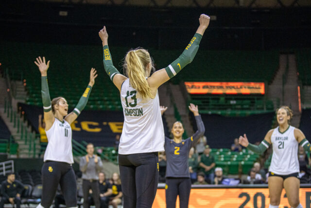The Bears celebrate during their sweep over Stephen F. Austin on Tuesday. Lilly Yablon | Photographer