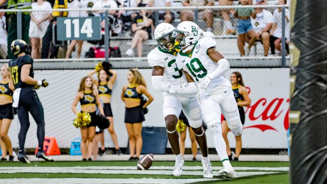 True freshman cornerback Caden Jenkins (19) celebrates his 72-yard scoop-and-score TD in the fourth quarter of Baylor football's conference game against UCF at FBC Mortgage Stadium in Orlando, Fla. Photo courtesy of Baylor Athletics