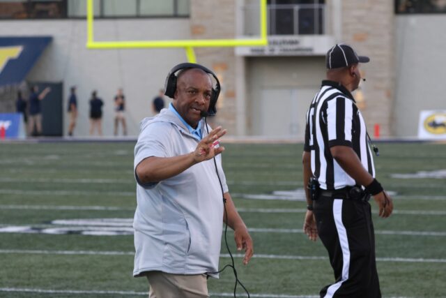 Long Island head coach Ron Cooper commands toward the sideline during the Sharks' 2022 season-opener against Toledo on Sept. 1, 2022 in the Glass Bowl in Toledo, Ohio. Photo courtesy of Long Island Athletics