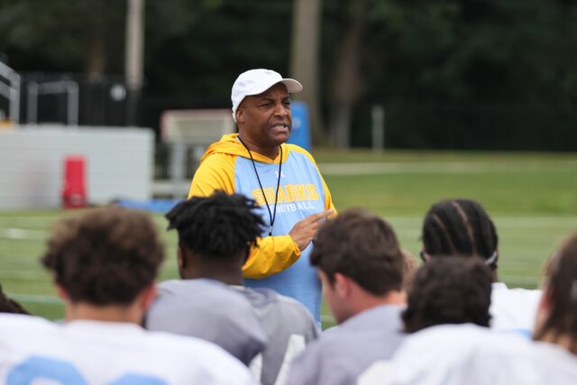 Long Island head coach Ron Cooper talks to his athletes during a team practice on Aug. 7 in Brookville, N.Y. 
Photo courtesy of Long Island Athletics