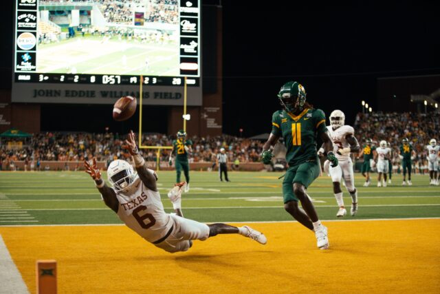 Junior wide receiver Ketron Jackson Jr. (11) hauled in three catches for 55 yards against the Longhorns. Assoah Ndomo | Photographer