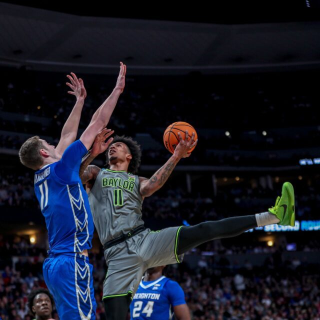 Jalen Bridges attacks the rim during Baylor men’s basketball’s NCAA Tournament round of 32 game against Creighton on March 19 in the Ball Arena in Denver. Kenneth Prabhakar | Photo Editor