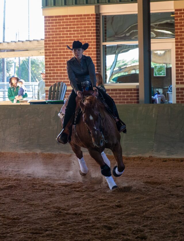 Sophomore western rider Kalena Reynolds secured Most Outstanding Performer in Reining after scoring a 71.5 on Cowboy. Michael Haag | Sports Editor