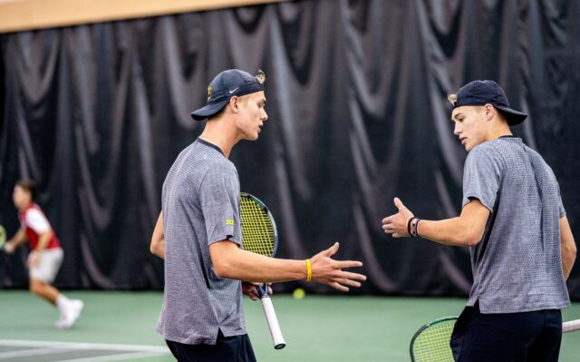 Freshman Devin Badenhorst (left) and sophomore Luc Koenig (right) have been doubles partners since childhood. Lilly Yablon | Photographer