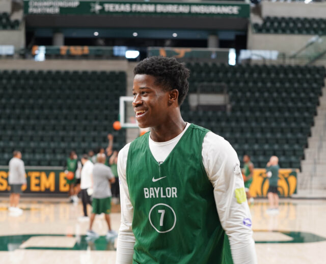 Freshman guard VJ Edgecombe is all smiles during Baylor men's basketball's first fall practice on Monday at Foster Pavilion. Foster Nicholas | Sports Editor