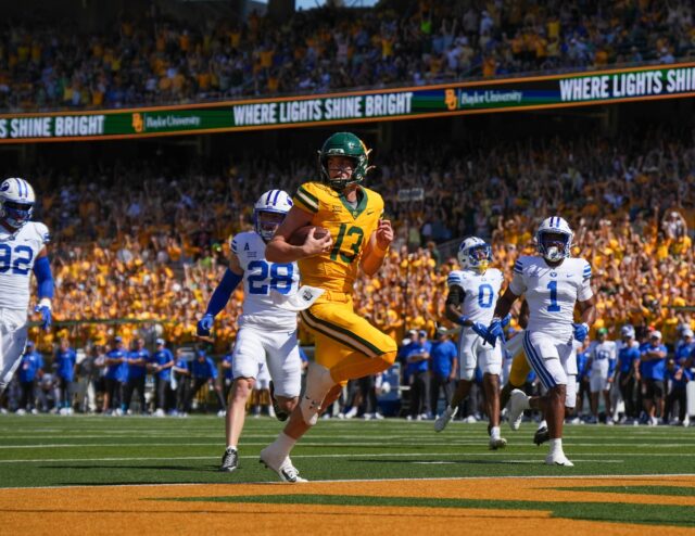 Sawyer Robertson (13) jogs into the end-zone to secure Baylor's first touchdown for the 34-28 loss against BYU. Mary Thurmond | Photographer