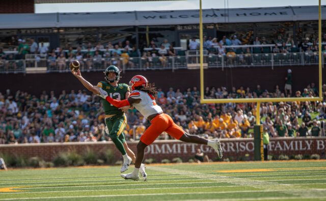 Redshirt junior quarterback Sawyer Robertson throws for a first down during Baylor football's 38-28 win over Oklahoma State on Saturday at McLane Stadium. Cameron McCollum | Photo Editor