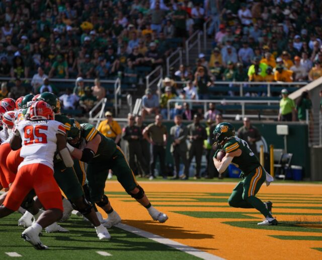 Sophomore running back Dawson Pendergrass takes a hand-off out of the end zone during Baylor football's 38-28 win over Oklahoma State on Saturday at McLane Stadium. Mary Thurmond | Photographer