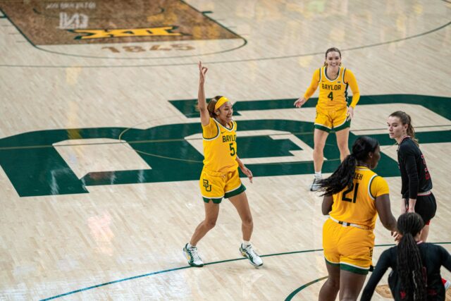 Junior forward Darianna Littlepage-Buggs celebrates knocking down a 3-pointer during No. 12 Baylor women's basketball's 85-33 win over Incarnate Word Thursday night at the Foster Pavilion. Kassidy Tsikitas | Photo Editor