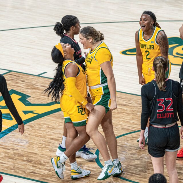 Graduate student forward Madison Bartley celebrates an 8 and-one layup with graduate student guard Sarah Andrews during No. 12 Baylor women's basketball's 85-33 win over Incarnate Word Thursday night at Foster Pavilion. Kassidy Tsikitas | Photo Editor