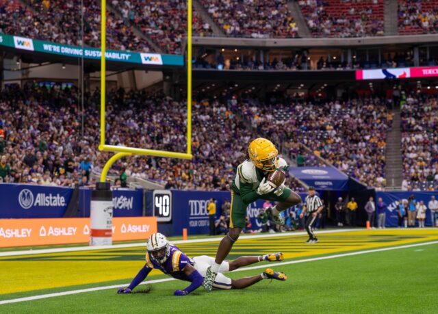 Senior wide receiver Ketron Jackson Jr. catches the ball  during Baylor's loss against LSU Tuesday night at NRG stadium in Houston. Mesha Mittanasala | Photographer