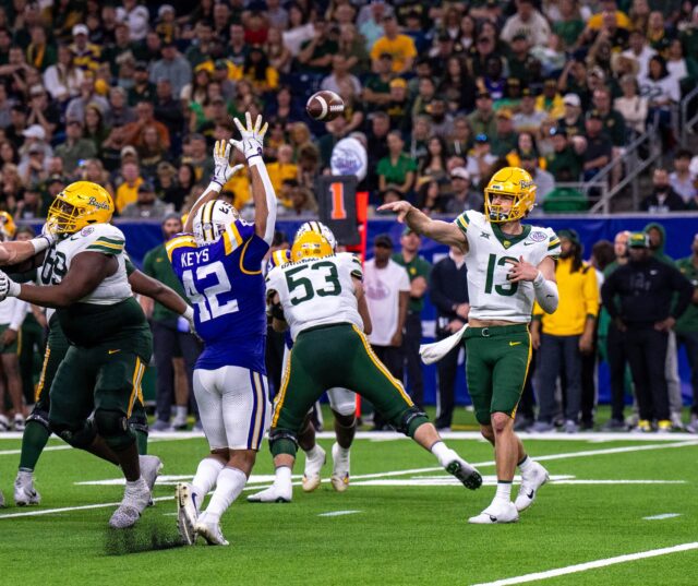 Redshirt junior quarterback Sawyer Robertson passes the ball during Baylor's loss against LSU Tuesday night at NRG stadium in Houston. Mesha Mittanasala | Photographer