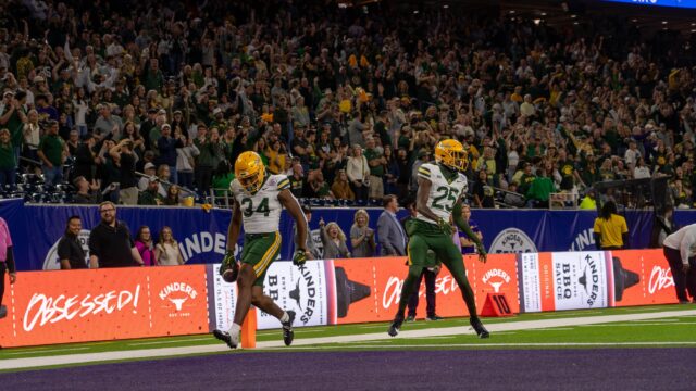 Redshirt junior wide receiver Josh Cameron scores a touchdown in the fourth quarter during Baylor's loss against LSU Tuesday night at NRG stadium in Houston. Mesha Mittanasala | Photographer