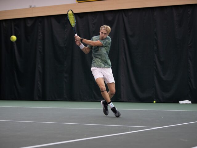 Alexandru Chirita receives a tough serve in his singles match against Al Pedrico Kravtsov. Brady Harris | Photographer