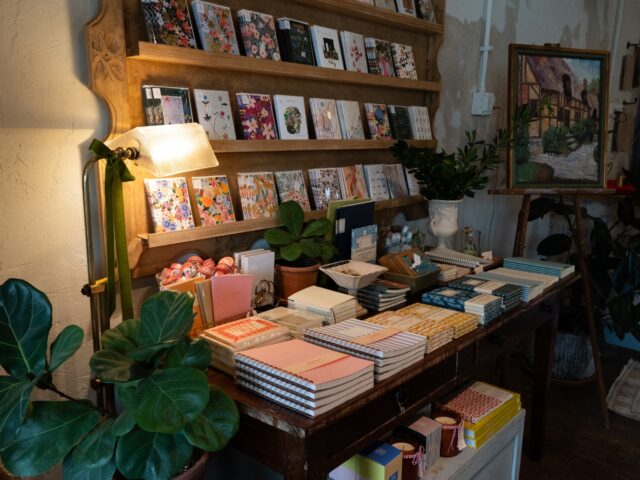 A decorated bookshelf full of planners at the Carpenter's Daughter. Brady Harris | Photographer