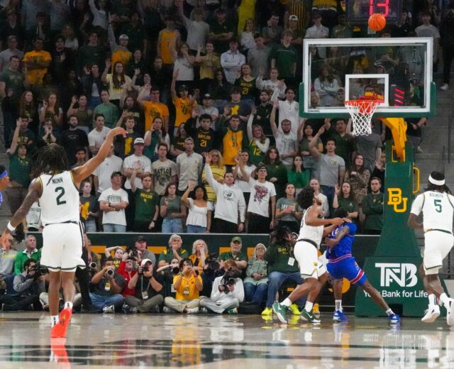 Guard Jaden Nunn shoots from the three point line during the Baylor vs Kansas Basketball Game at Foster Pavillion.