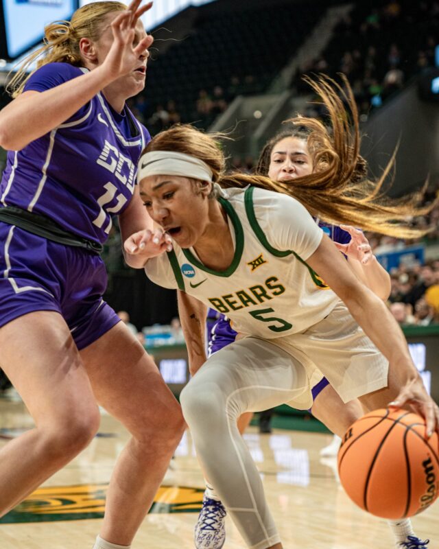 Junior guard Darianna Littlepage-Buggs almost loses the ball to defenders during No. 4 seeded Bears' 73-60 win over No.13 seeded Grand Canyon Friday afternoon at the Foster Pavillion. Kassidy Tsikitas | Photo Editor