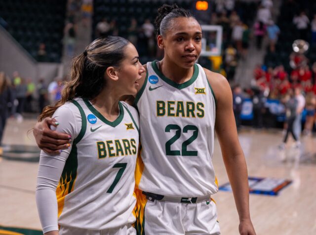 Junior guard Waiata Jennings comforts junior guard Bella Fontleroy at the end of the No. 4 seeded Bears' loss against No.5 seed Ole Miss Sunday afternoon at the Foster Pavilion. Mesha Mittanasala | Photographer