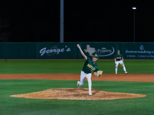 Senior right-handed pitcher Caleb Bunch throws a heater towards home plate in the Bears' 13-4 win against UTA at Baylor Ballpark. Brady Harris | Photographer