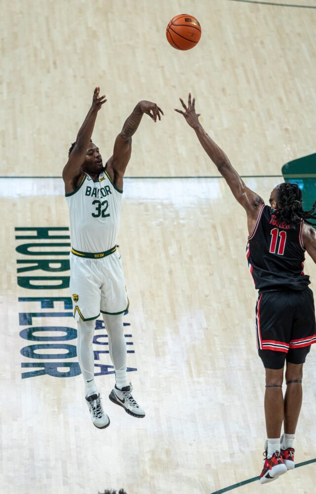 Graduate guard Jalene Celestine shoots from behind the 3-point line during Baylor men's basketball's game against No.3 Houston Saturday at Foster Pavilion. Kassidy Tsikitas | Photo Editor