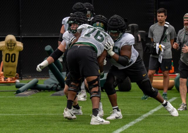 Offensive linemen redshirt senior Ryan Lengyel (BL), redshirt senior Sidney Fugar (BR), and redshirt sophomore Isaiah Robinson (F) run through a 1-on-2 drill during Baylor football’s spring practice at the Baylor Football Practice Field on Tuesday afternoon. Mary Thurmond | Photo Editor