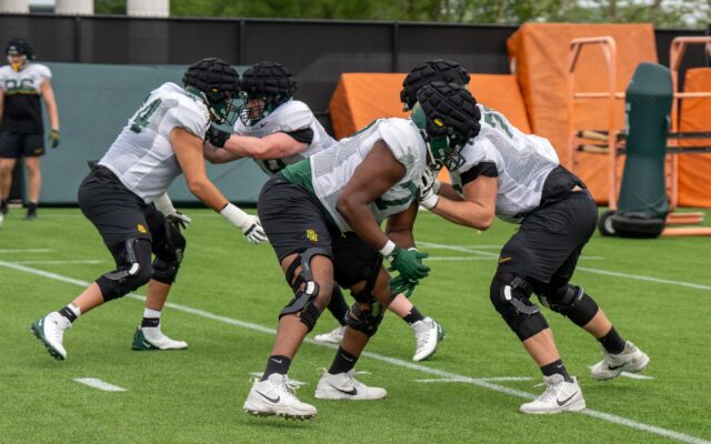 Baylor's offensive linemen run through a 1-on-1 drill in sets during Baylor football’s spring practice at the Baylor Football Practice Field on Thursday afternoon. Mary Thurmond | Photo Editor