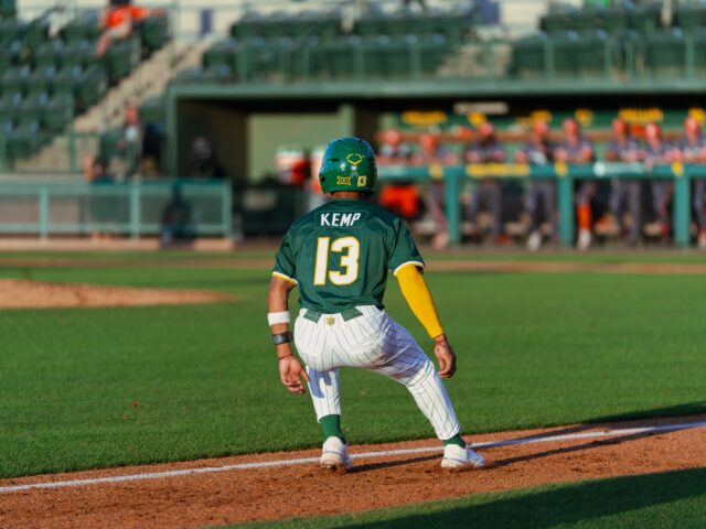Senior shortstop Tyriq Kemp stops dead in his tracks after rounding third in the Bears' win against UTRGV Tuesday night at Baylor Ballpark. Brady Harris | Photographer