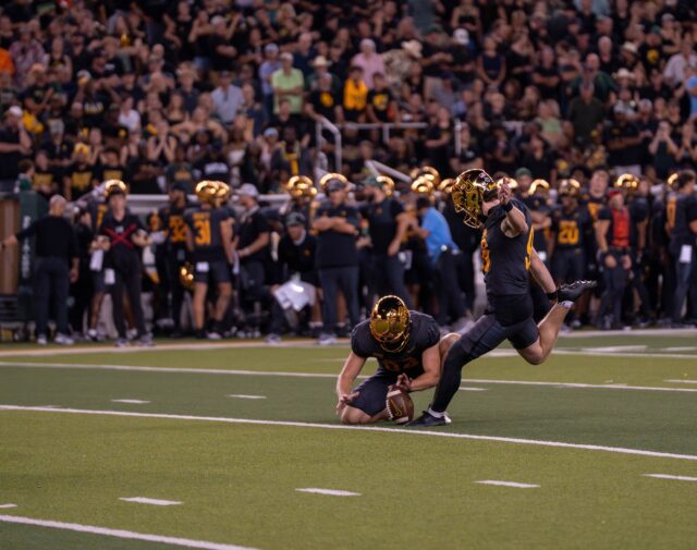 Redshirt freshman Connor Hawkins goes for the extra point