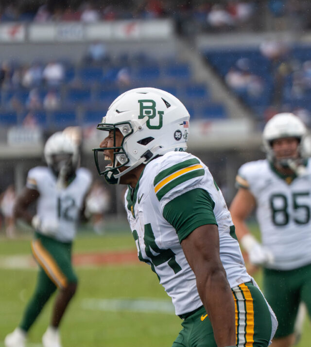 Redshirt senior wide receiver Josh Cameron celebrates after scoring a 33-yard touchdown during Baylor’s 48-45 double-overtime win over No. 17 SMU Saturday at Gerald J. Ford Stadium in Dallas. Mary Thurmond | Photo Editor