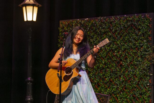 Caitlin Liman performs a multilingual melody of "Great Is Thy Faithfulness," combining English, Bahasa, Indonesian and Spanish Friday night at After Dark. Jake Schroeder | Photographer