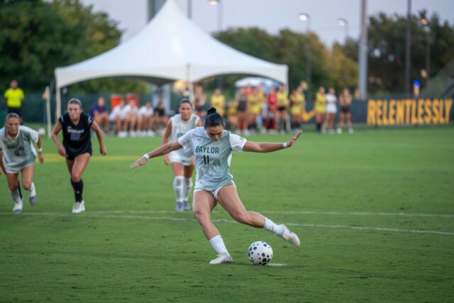 Senior forward Tyler Isgrig takes a shot at the goal during the Bears' 2-0 victory over ACU on Sunday. Sam Gassaway | Photographer