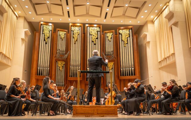 The Baylor Symphony Orchestra, conducted by professor Jeffrey D. Grogan, performs Tchaikovsky's Fifth Symphony at the Jones Concert Hall on Monday. Sam Gassaway | Photographer