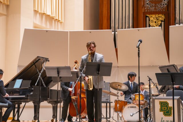 Hewitt Sophomore saxophonist Robert Nelson took the spotlight for a solo during the ensemble. Jake Schroeder | Photographer