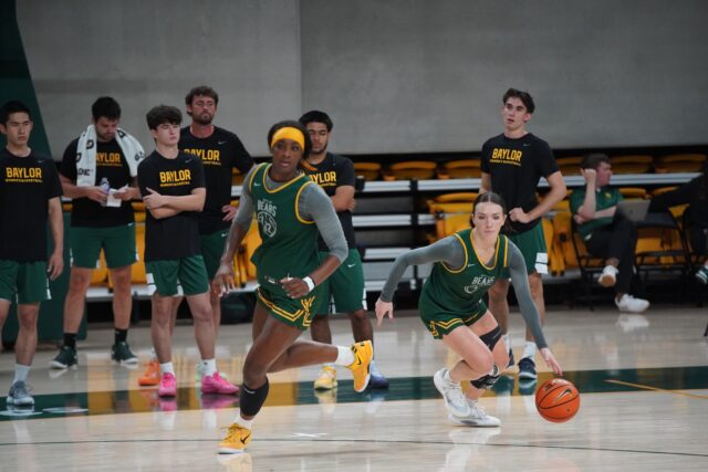 Redshirt Junior Forward Kyla Abraham and